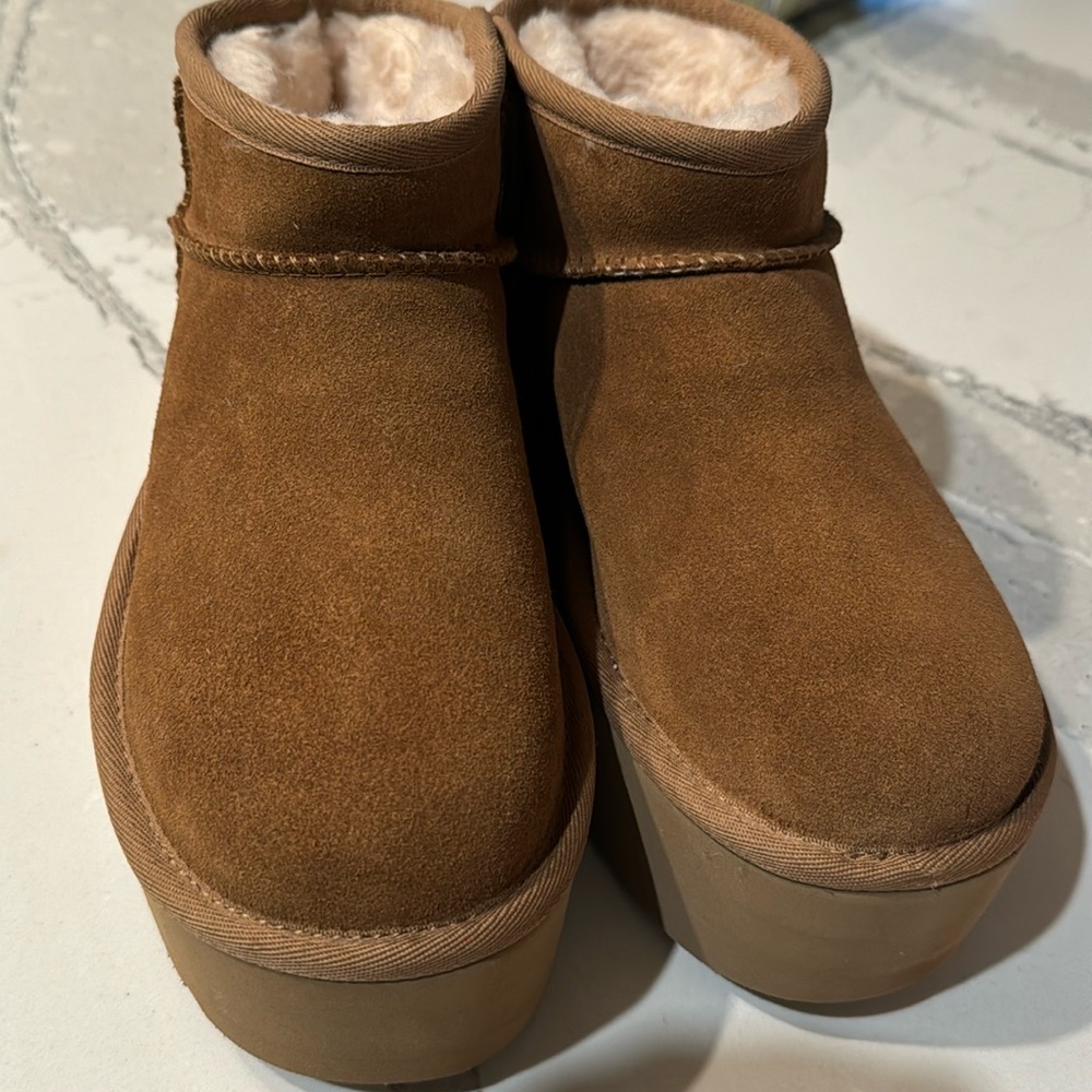 Brand new* never worn* Ugh platform ultra mini